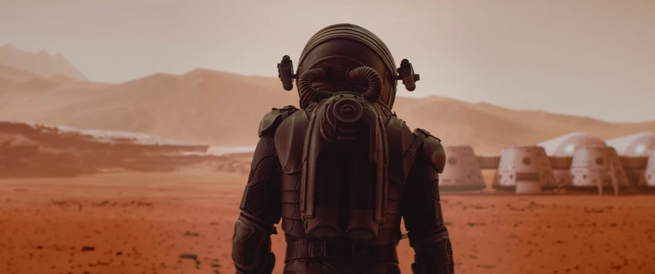 Back view of astronaut wearing space suit walking on a surface of a red planet. Martian base and rover in the background. Mars colonization concept